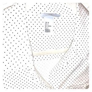 White blouse with black polka dots